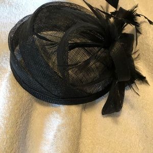 Cute dress hat with feathers